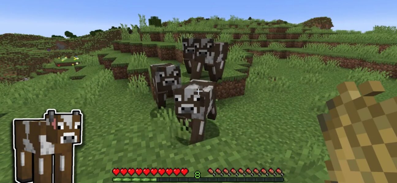 cows roaming in the overworld and following the player when he shows wheat to them.